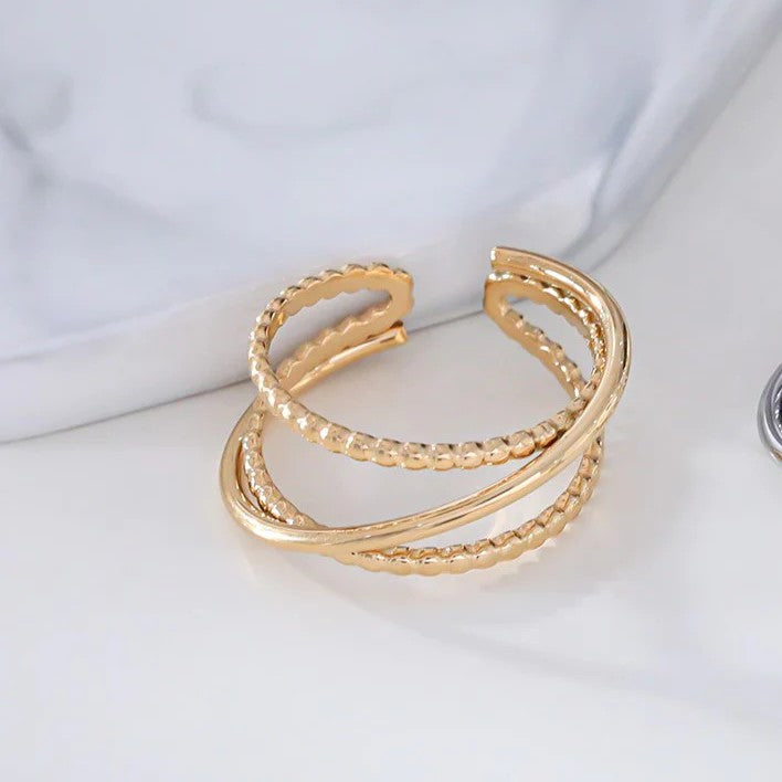 Bague fils croisés ajustable en acier inoxydable finition poli & perlé