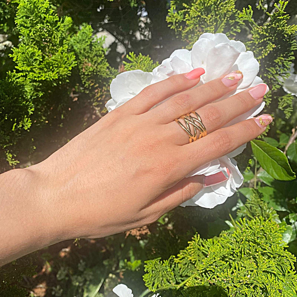 Bague large ajustable entrelacée en acier inoxydable doré