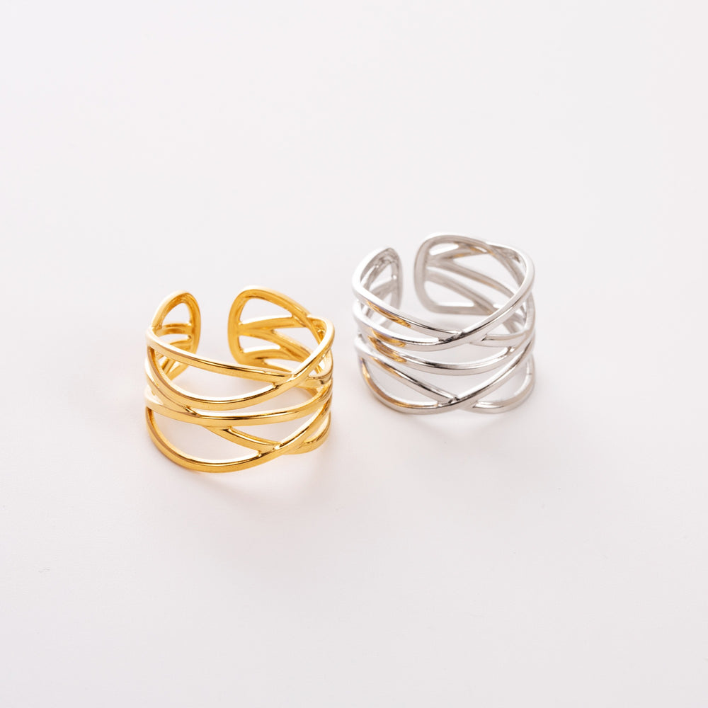 Bague large ajustable entrelacée en acier inoxydable - version argenté ou doré