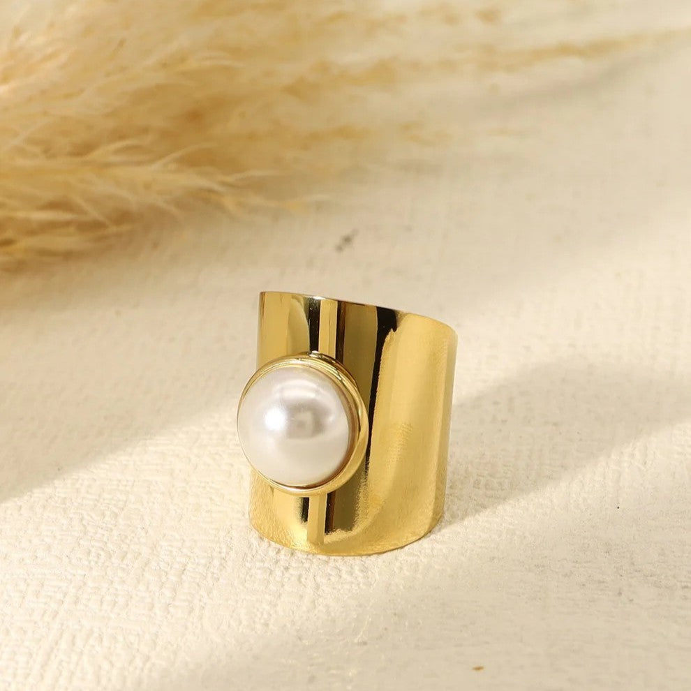 Bague large ajustable en acier inoxydable - version doré ou argentée - perle synthétique