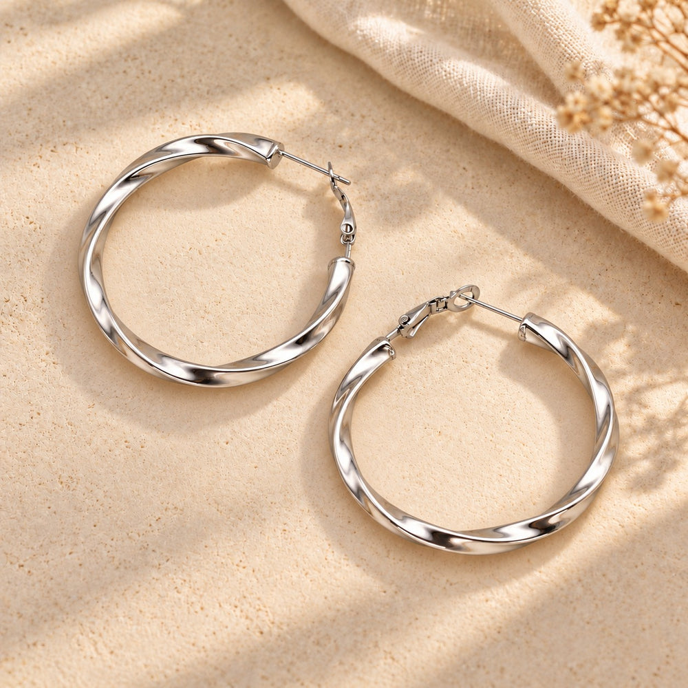 Boucles d'oreilles créole torsadée en acier inoxydable - version dorée ou argenté - 40mm