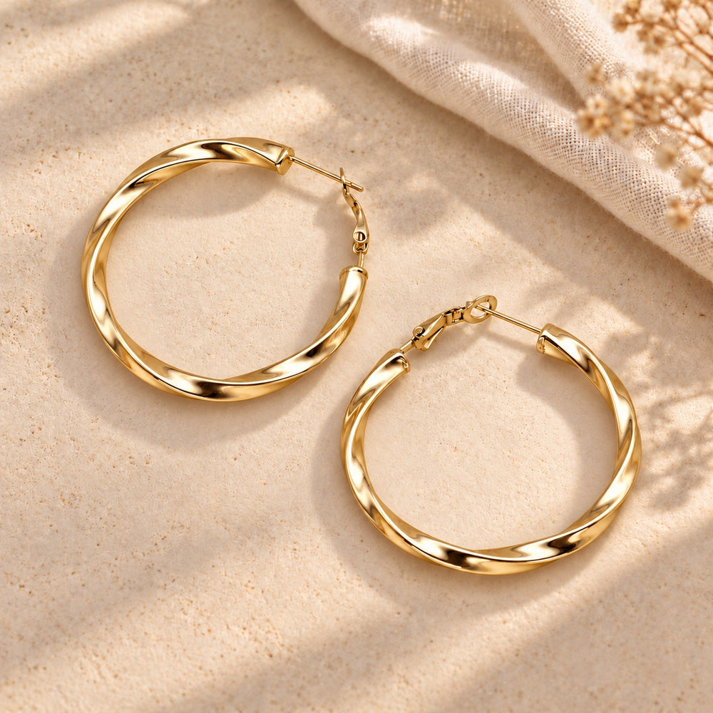 Boucles d'oreilles créole torsadée en acier inoxydable - version dorée ou argenté - 40mm