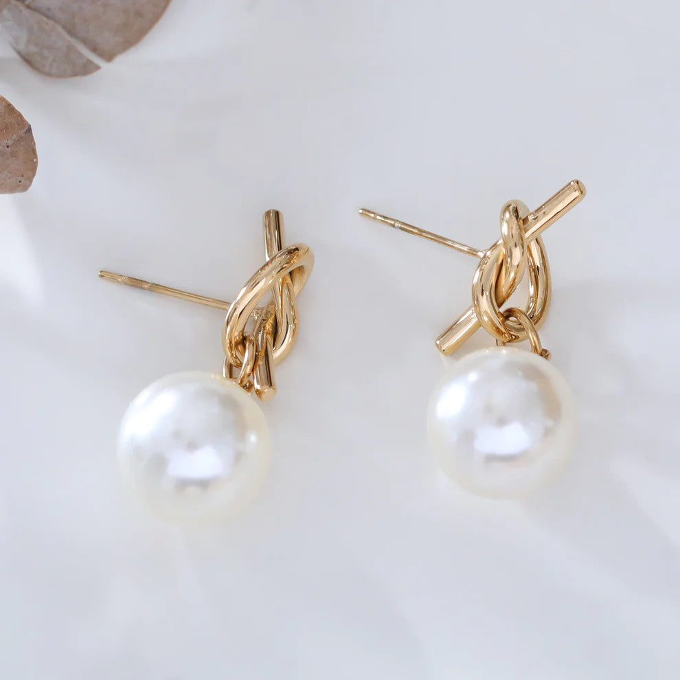 Boucles d'oreilles en acier inoxydable doré forme nœud - Perle synthétique