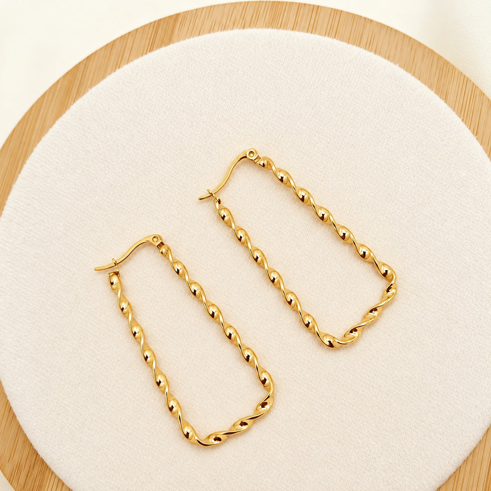 Boucles d'oreilles en acier inoxydable doré - créole rectangle torsadé