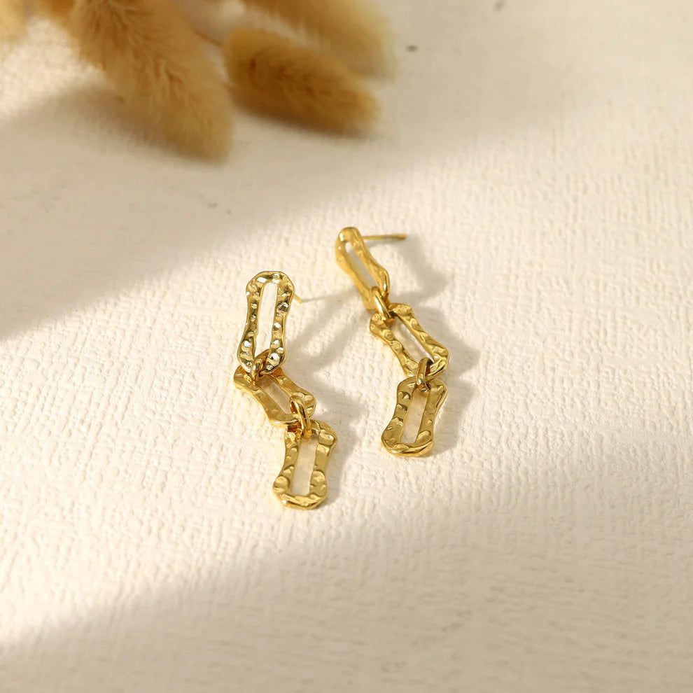 Boucles d'oreilles acier inoxydable doré pendante  martelé