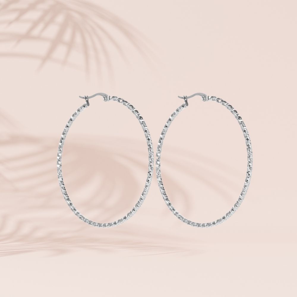 boucles d'oreilles créole facetée acier inoxydable diamètre 50mm