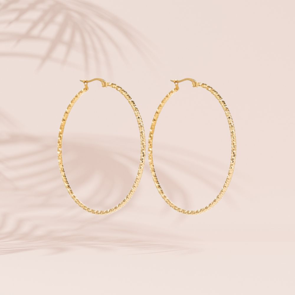 boucles d'oreilles créole acier inoxydable doré facetée diamètre 50mm
