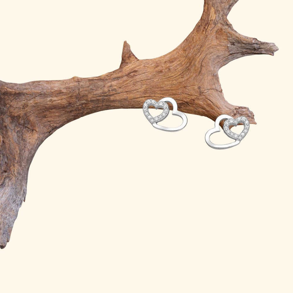 Boucles d’oreilles cœurs entrelacés en argent 925 rhodié avec zirconia blancs