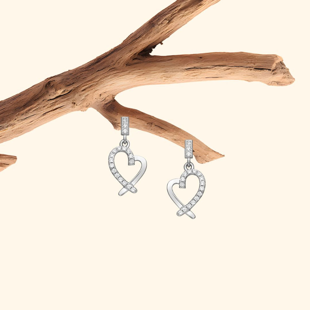 Boucles d'oreilles cœur en argent 925 rhodié serties de zirconia