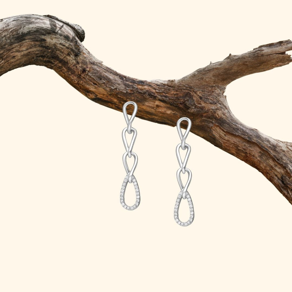 Boucles d'oreilles pendantes en argent 925 rhodié serties de zirconia