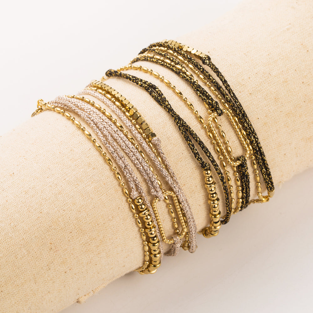 Bracelet en acier inoxydable doré / tissu brillant