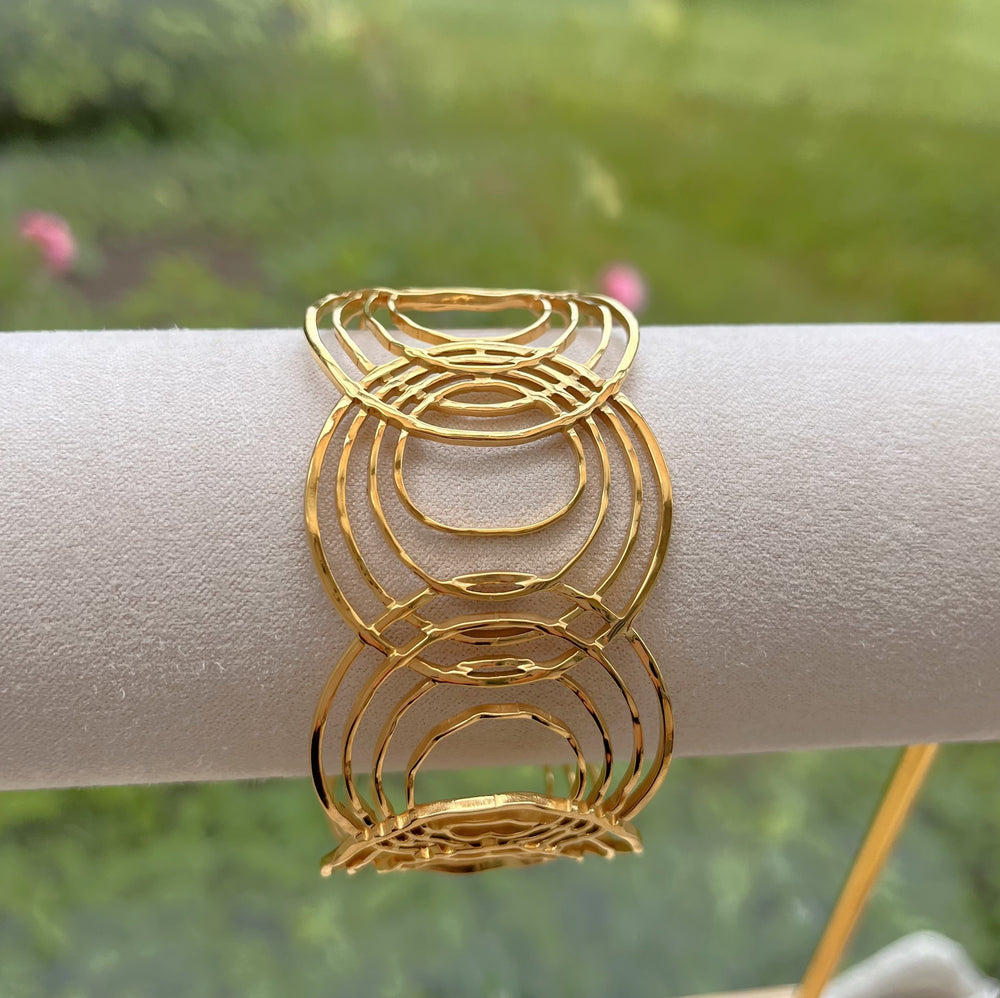 Bracelet manchette en acier inoxydable doré "Motifs muti-cercles croisés"