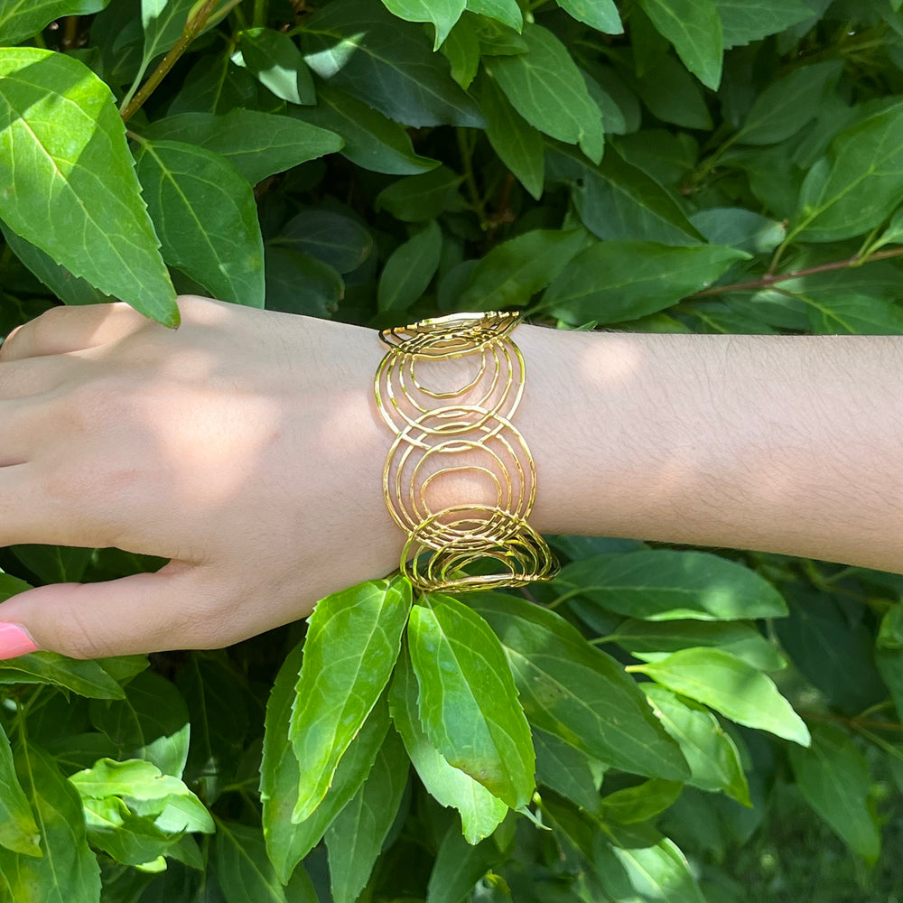 Bracelet manchette en acier inoxydable doré "Motifs muti-cercles croisés"