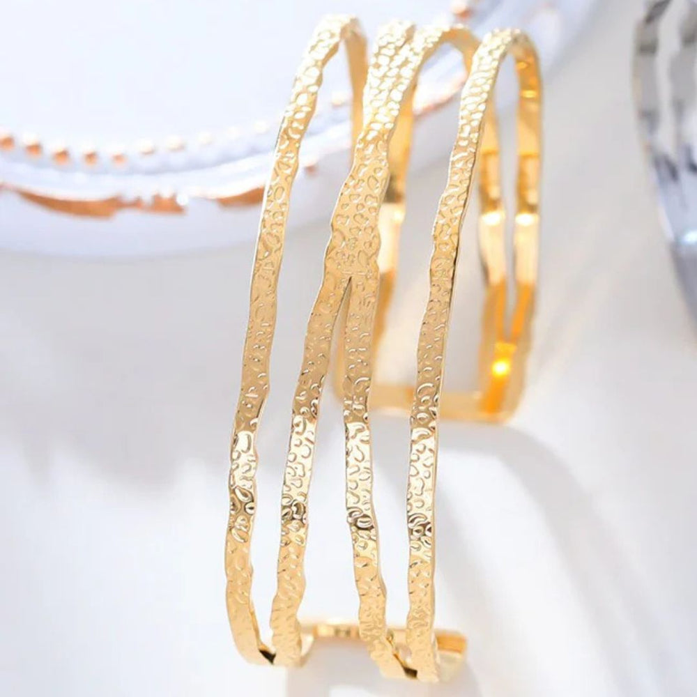 Bracelet manchette en acier inoxydable doré