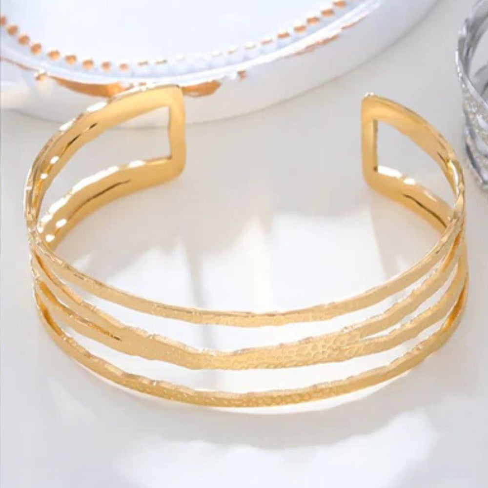 Bracelet manchette en acier inoxydable doré