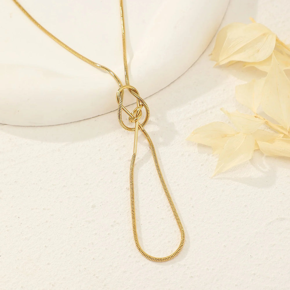 Collier en acier inoxydable doré "Chaîne maille serpent avec nœud"
