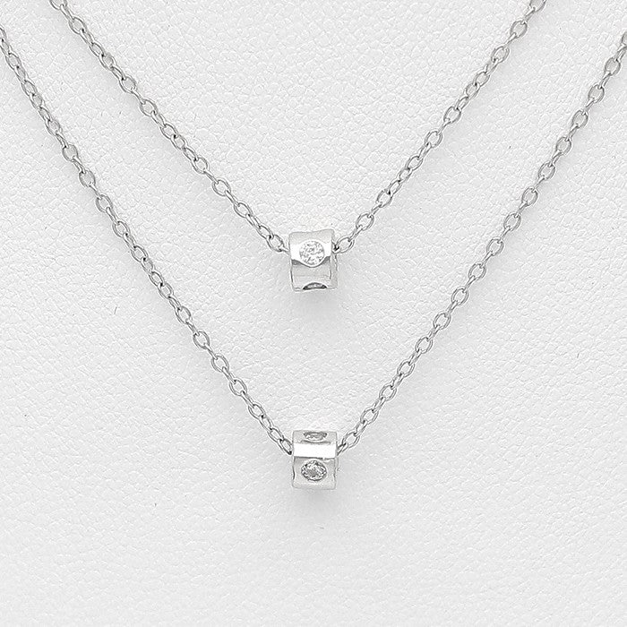 Collier en argent 925 rhodié double chaîne avec pendentif cylindre et zirconia