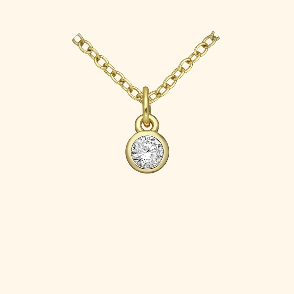 Pendentif rond en argent 925 doré serti d’un zirconia