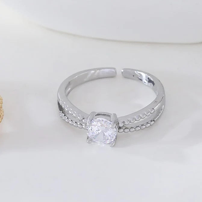 Bague solitaire en acier inoxydable avec strass et lignes perlées