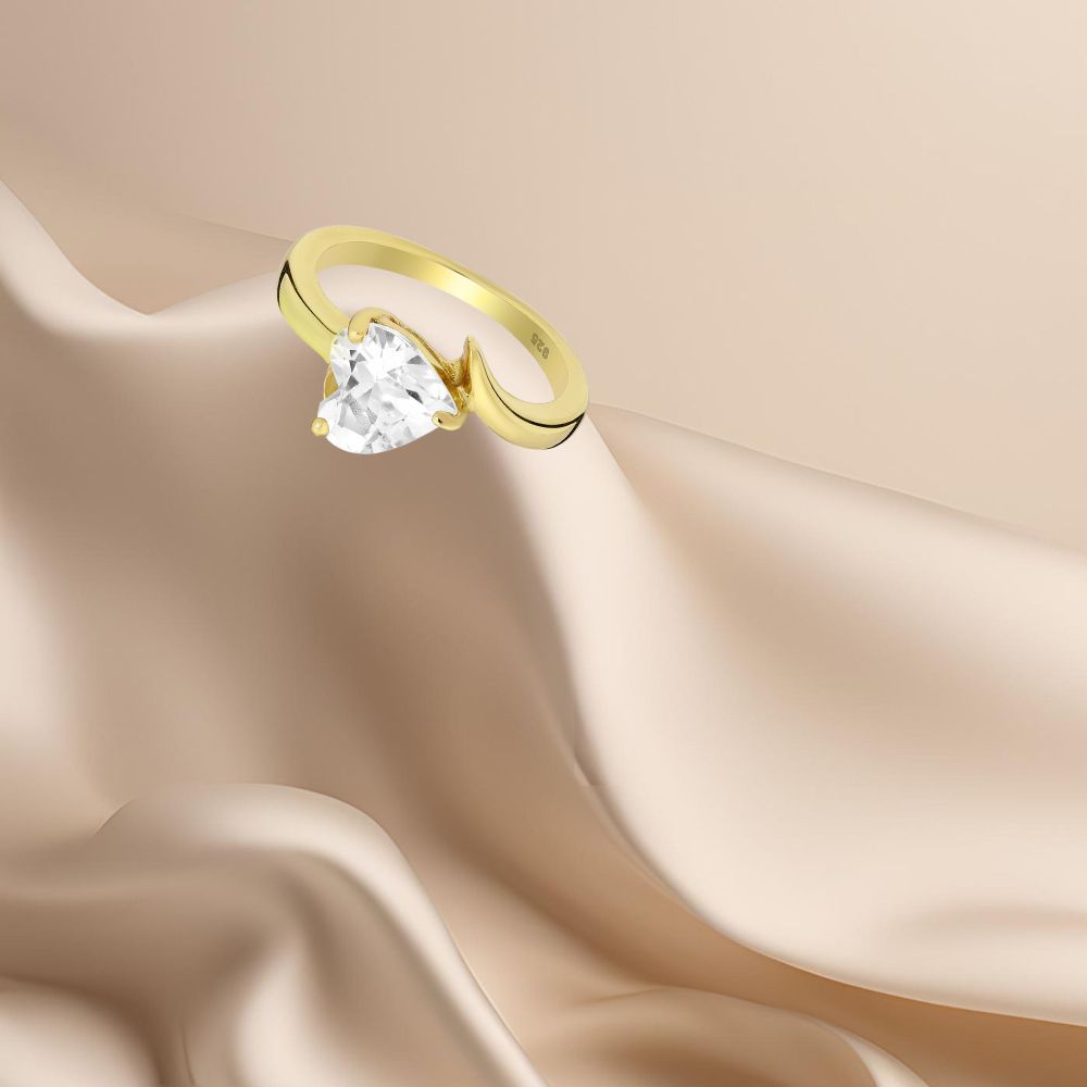 Bague argent 925 doré sertie d'un coeur en zirconium blanc