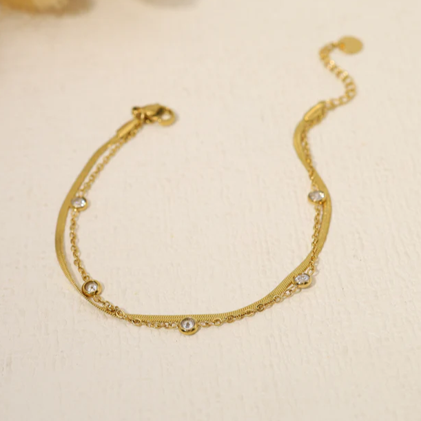 Bracelet acier inoxydable doré double chaîne avec strass