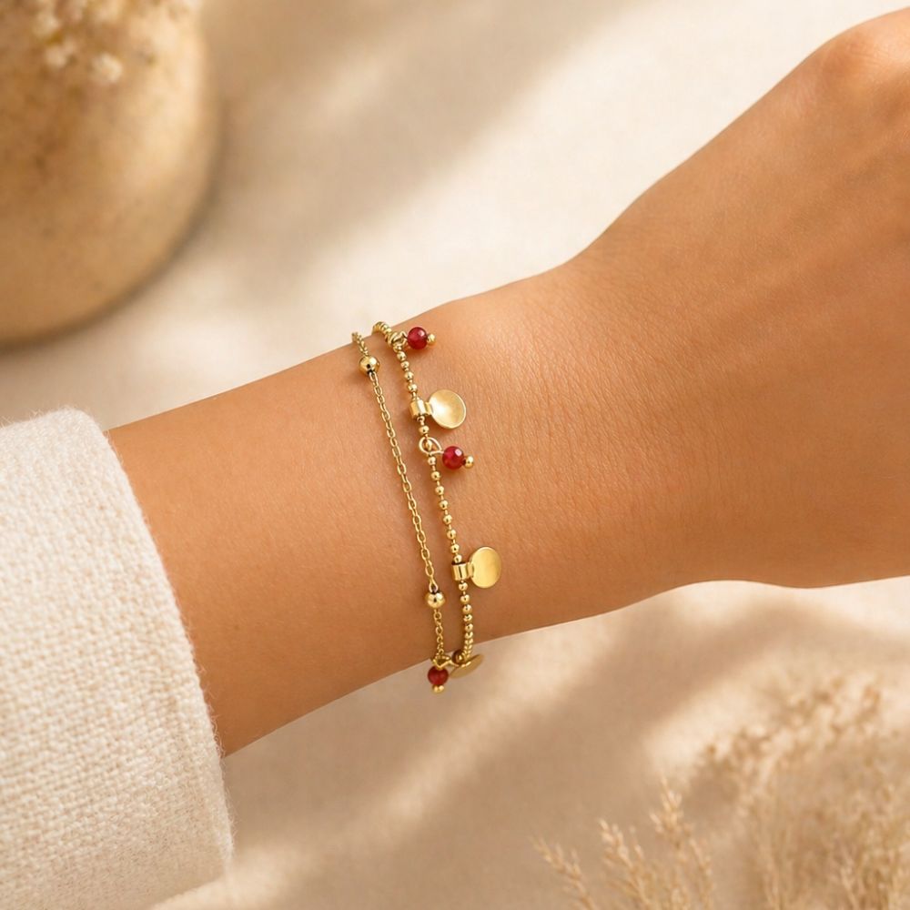 Bracelet acier inoxydable doré pastilles et cristaux rouges